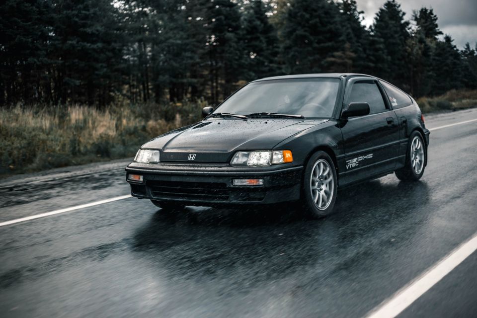 Honda black car with stickers