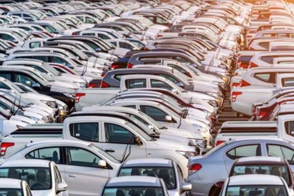 pre owned cars parked outdoors