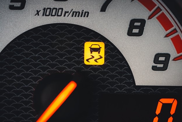 Traction warning light on car's dashboard