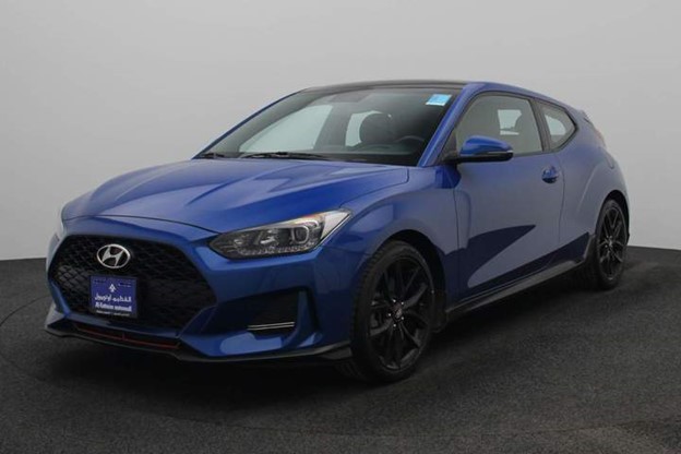 Front and angled view of a blue Hyundai Veloster