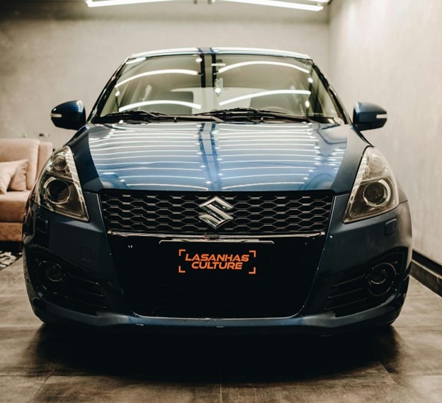 Front View of a Blue Suzuki Swift