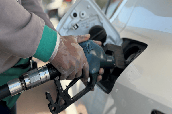 Hands holding Petrol pump