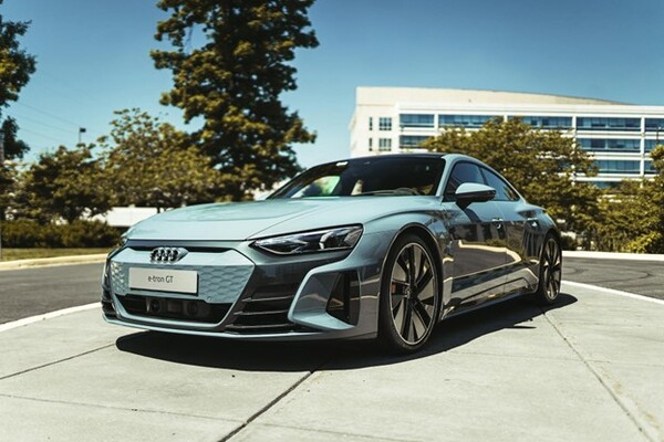 A Silver  Audi e-tron GT quattro car parked on the road